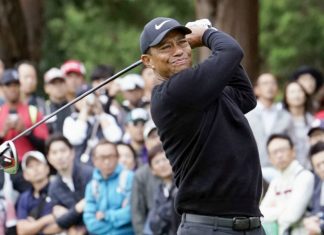 Chiba: Woods seul en tête